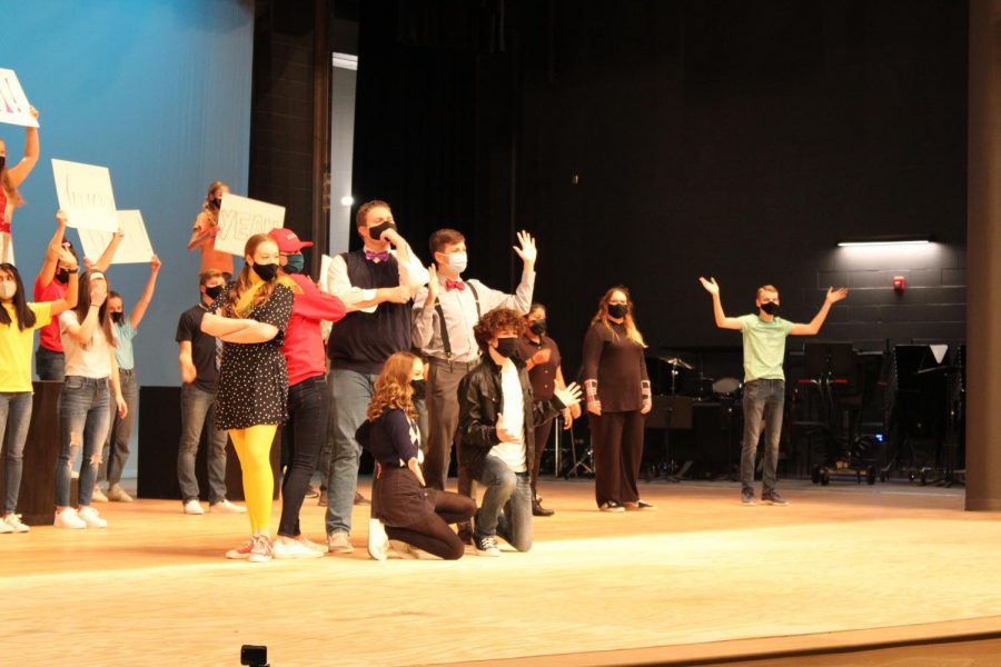 The leads of the musical all together at the end of the scene.