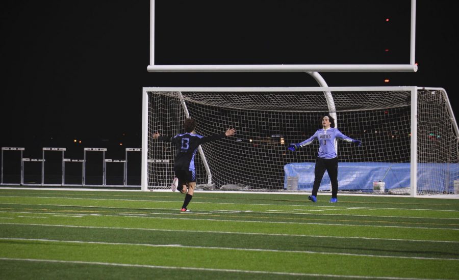 Landon Kennington (13), 11, and Parker Mahloch (0), 11, celebrating after winning the game.
Photo by: Tara Binte Sharil