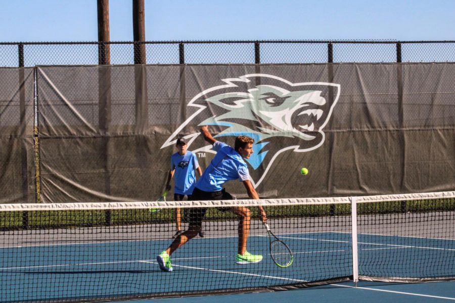 Ian Armbrust hitting a backhand