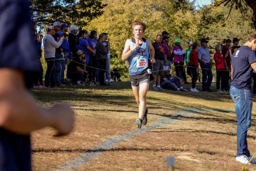 Jack Sinnott racing against time as he catches up to the opponent in front of him.