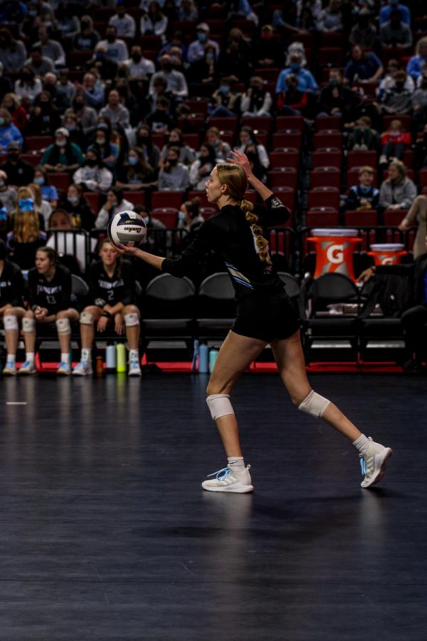 Shay Heaney serving the ball. 