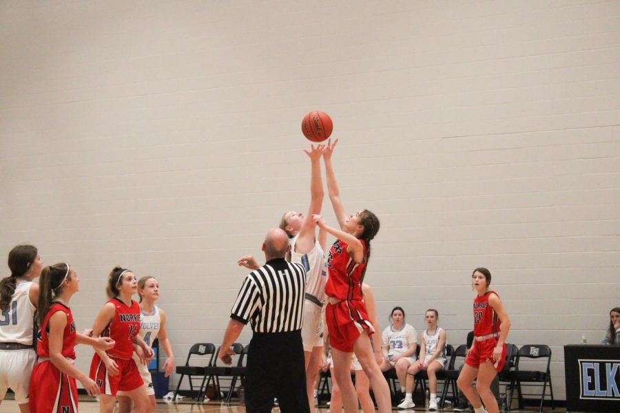 Emma Whalen getting the tip during the jump ball at the beginning of the game.
