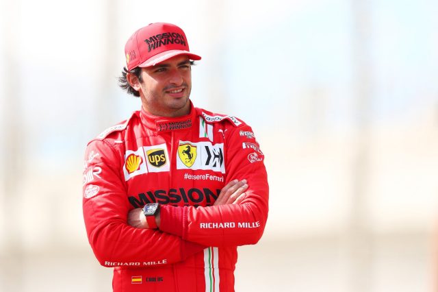 Carlos Sainz smirks as he placed fifth in the drivers championship. Sainz was the leading Ferrari in the 2021 season. 