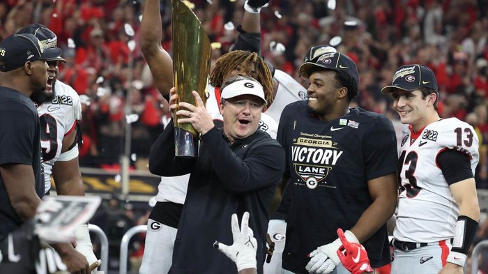 Kirby+Smart+holding+his+National+Championship+Trophy