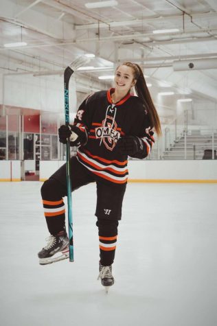 A photo of Saldi in her hockey uniform.