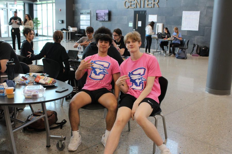 Ergashev and Piatowski match from head to toe with their hot pink Creighton tees. 