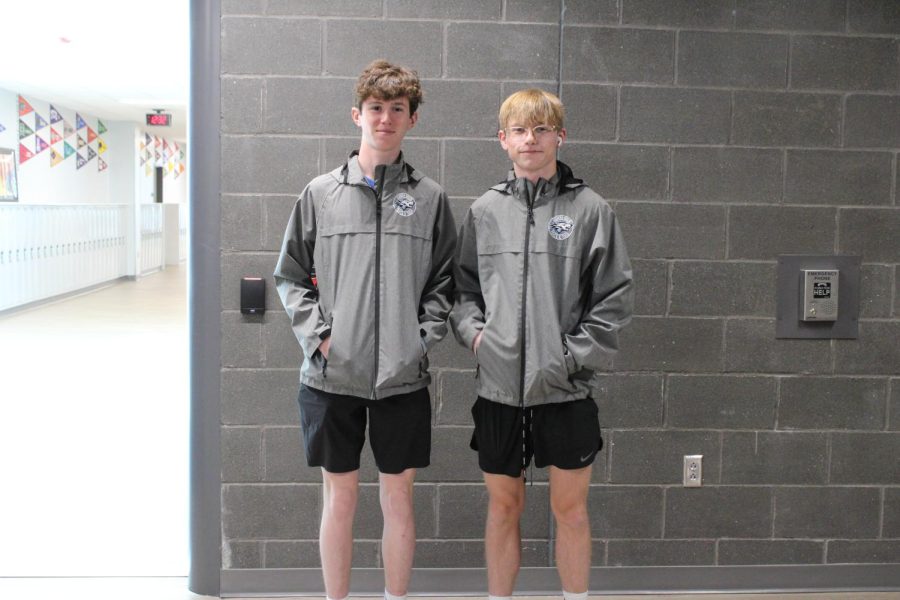 Ross and Pithan wear their track windbreakers for twin day. 