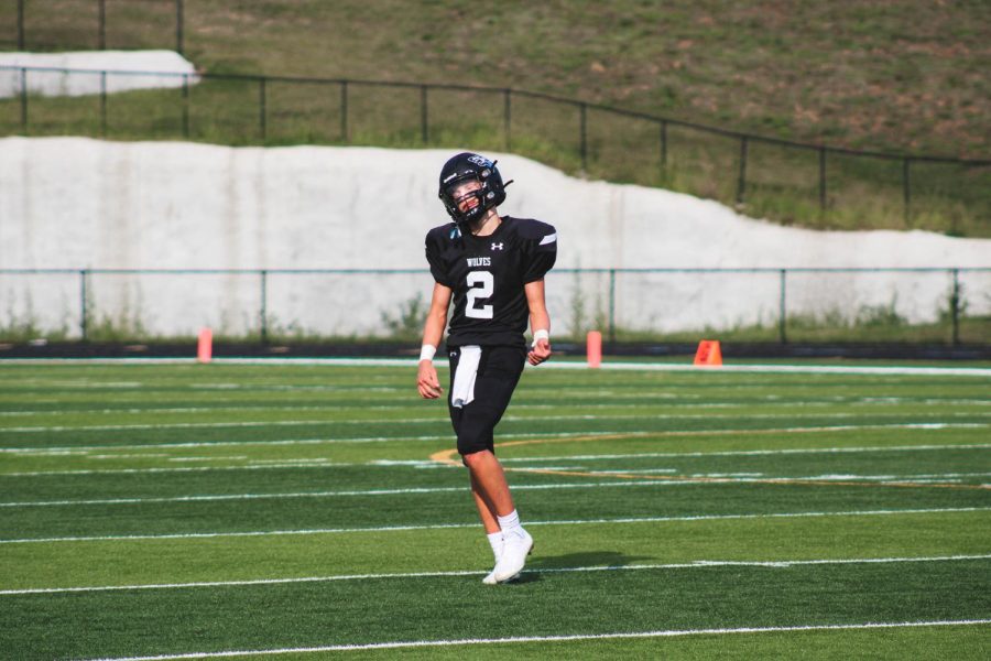 #2, Ethan Beachy, rocking out after the third quarter. Beachy is the freshman quarterback this season, and he led the wolves to a W for their first game. 