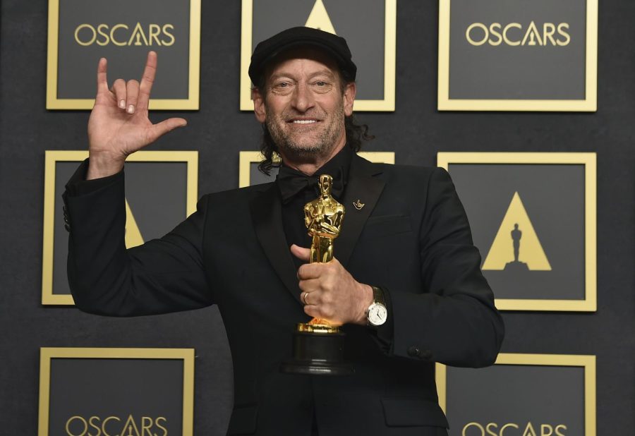 Troy Kotsur poses with his Oscar after his historical win in CODA. This is Kotsurs first Oscar win and nomination and is the first deaf actor to win an Oscar. 