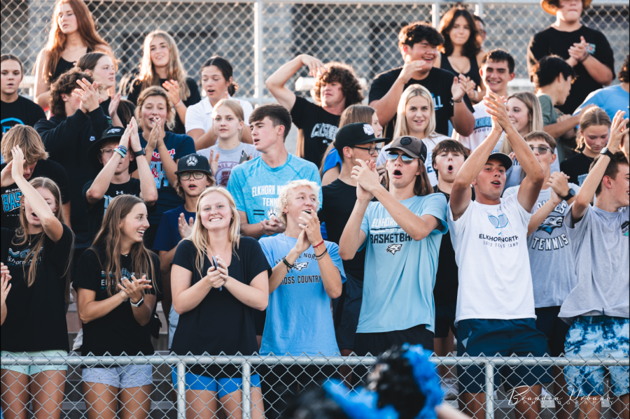 (L-R) Seniors Morgan Going, Hannah Nadgwick, Caleb Polking, Garrett Heaney, and Ian Armbrust clapping to different cheers as the new seniors lead the student section for the first time this year. It is the first time the Class of 2023 lead the student section. 