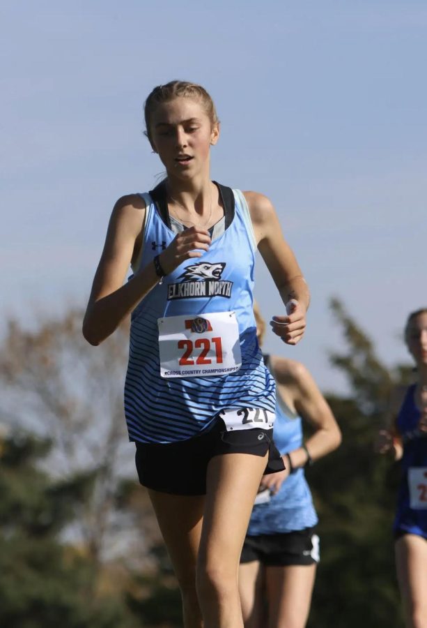 Freshman Jenna Polking racing in the front of the pack at the Class B State Championships on Friday, October 21. 