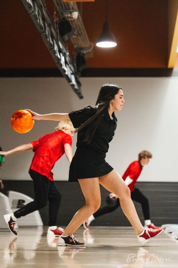 Ellie Lary, junior, waits patiently before releasing her ball down the lane.