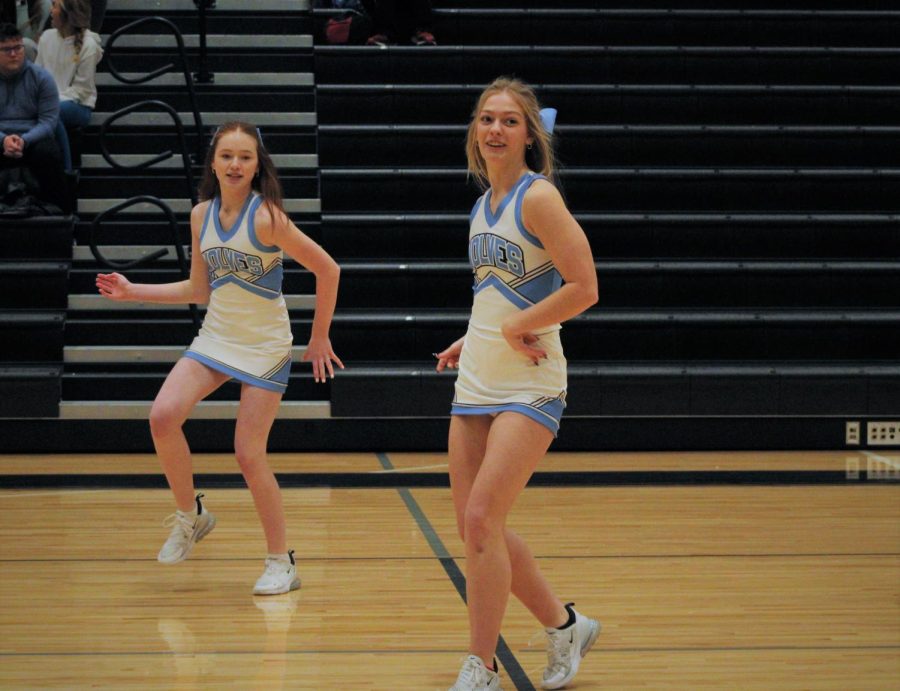 Sophia Bandfield (front) and Alie Dixon (back) sway to the music as they perform their dance routine. Both spread joy with their moves at the pep rally.