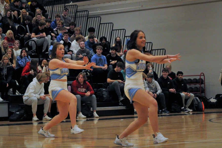 Karlie Efaw (front) and Loghan Evert (back) dance to their routine at the pep rally. Both show off their amazing moves.