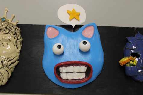 Ceramic mask project by Junior Elena Koske. Ceramics II classes allow the students to explore different techniques with clay. 