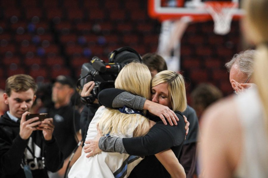 Junior Britt prince hugging her mom and head coach Anne prince after winning state for the 3rd time in a row. Britt was recently named Gatorade player of the year. 