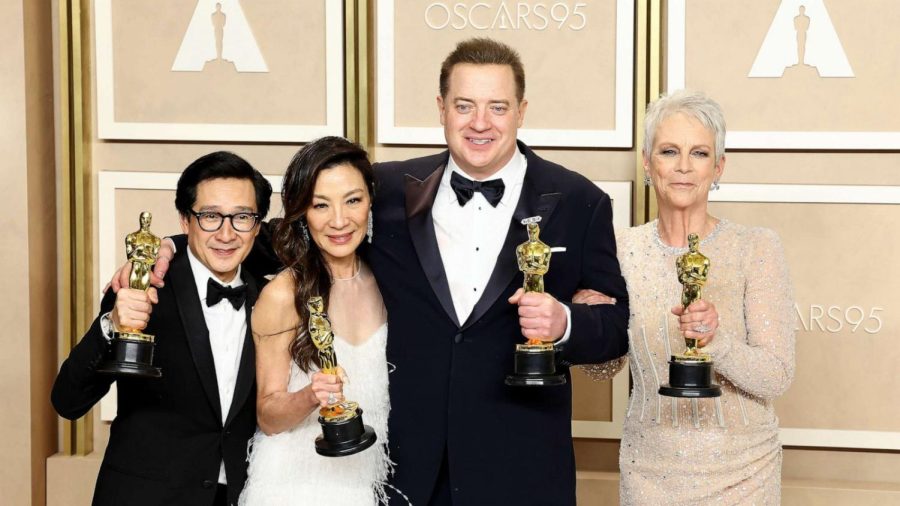 (L-R): Ke Huy Quan, Michelle Yeoh, Brendan Fraser, and Jamie Lee Curtis posing for a group photo after winning their respective categories. 