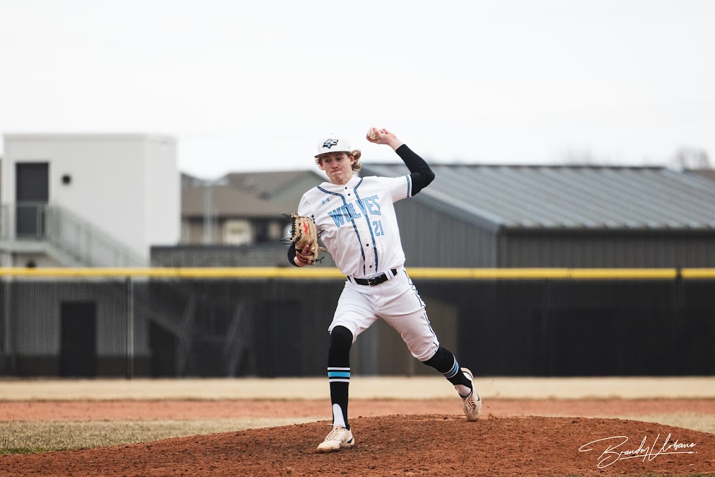 Senior pitcher Braden McCafferty pitching on Tuesday, April 18 vs Elkhorn High. He helped lead the Wolves to an 11-5 victory over the Antlers.
