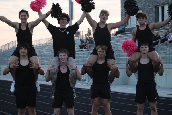 Seniors Austen Allen, Austin Shirley, Collin McMahon, Aidan Claris, Jayse Munter, Tytus Kunz, Zac Horner and Tyler Murphy cheer lead at the girls powder puff game on September 13, 2023. They help hype up the student section with chants and games. 