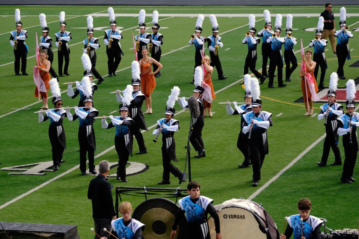 The Sound of the Wolfpack marching band performing their show on the field at Millard South
photo courtesy of Matt Rom