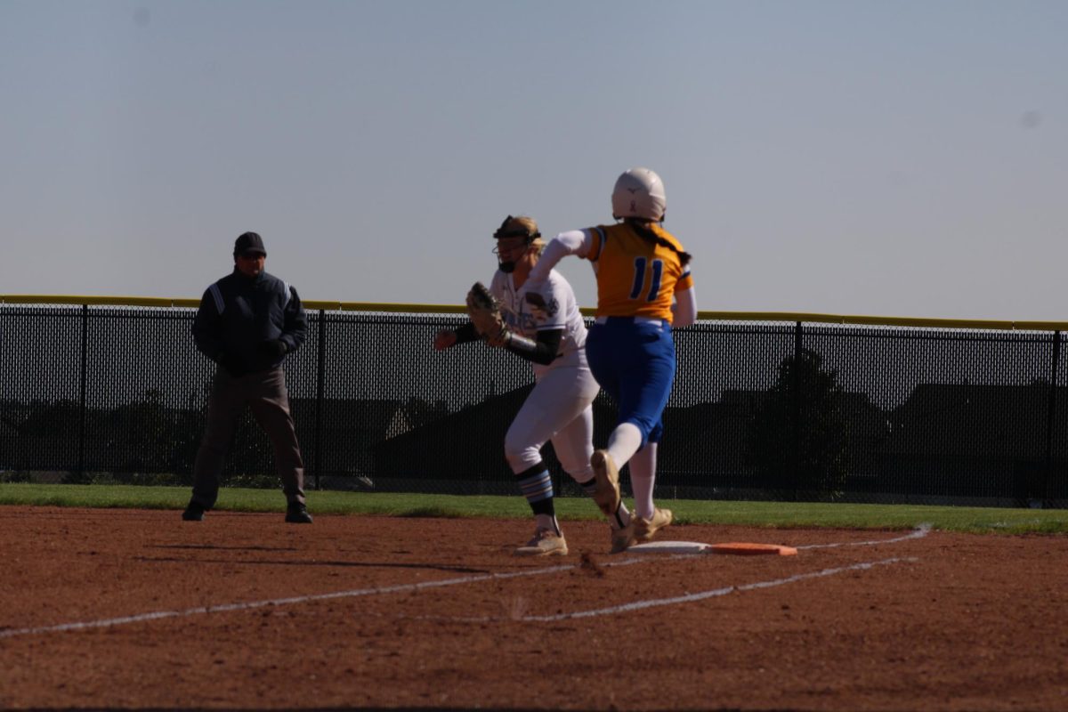 Kelsey Daubert getting a runner out at first base. Daubert is a sophomore and played first base the entire game. 