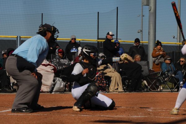 Reese Pearson catching behind home plate. Reese Pearson has a sister, Reagan, who is also on varsity softball. 