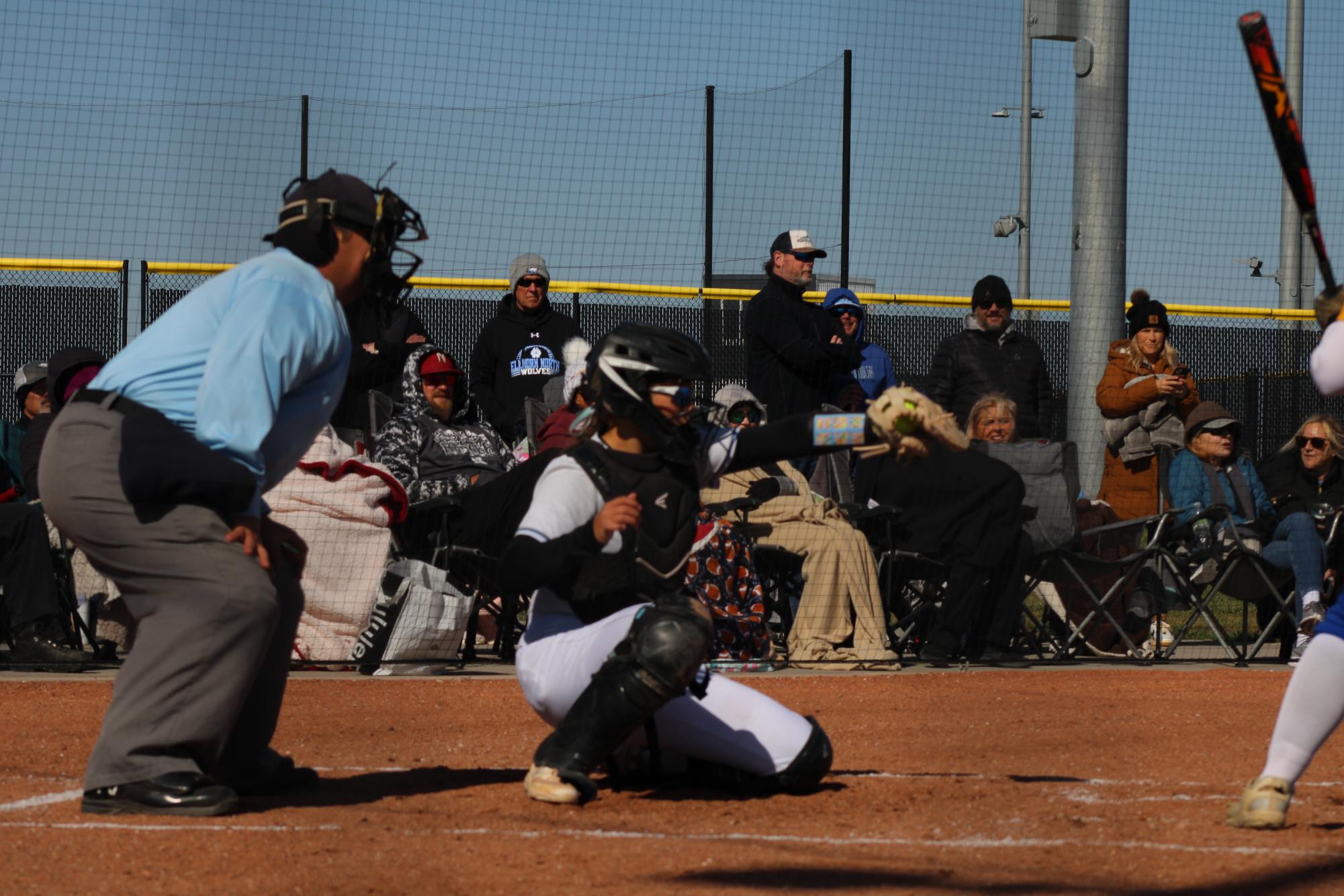 Reese Pearson catching behind home plate. Reese Pearson has a sister, Reagan, who is also on varsity softball. 