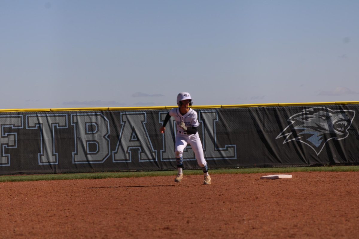 Koral Jarzynka runing to third base. Jarzynka subs in for Coleman as she is a runner for varsity softball.  