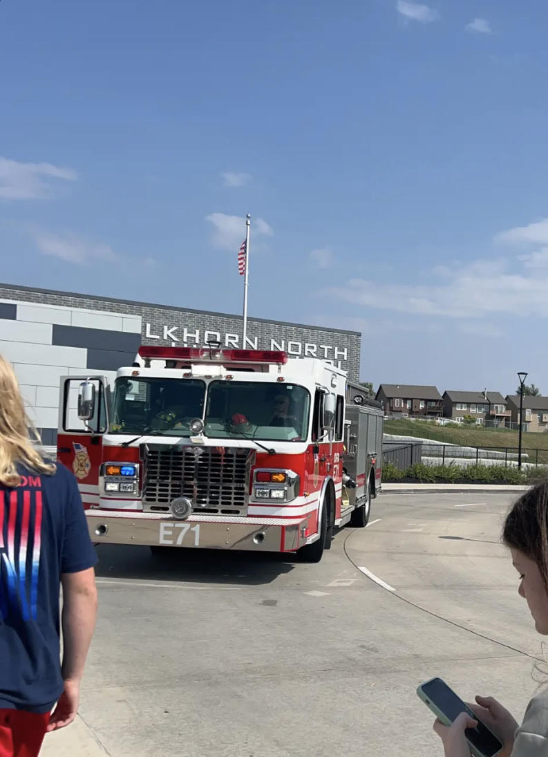 Firefighters arrive at the school after a fire alarm went off on September 5, 2023. All students were evacuated outside the building.