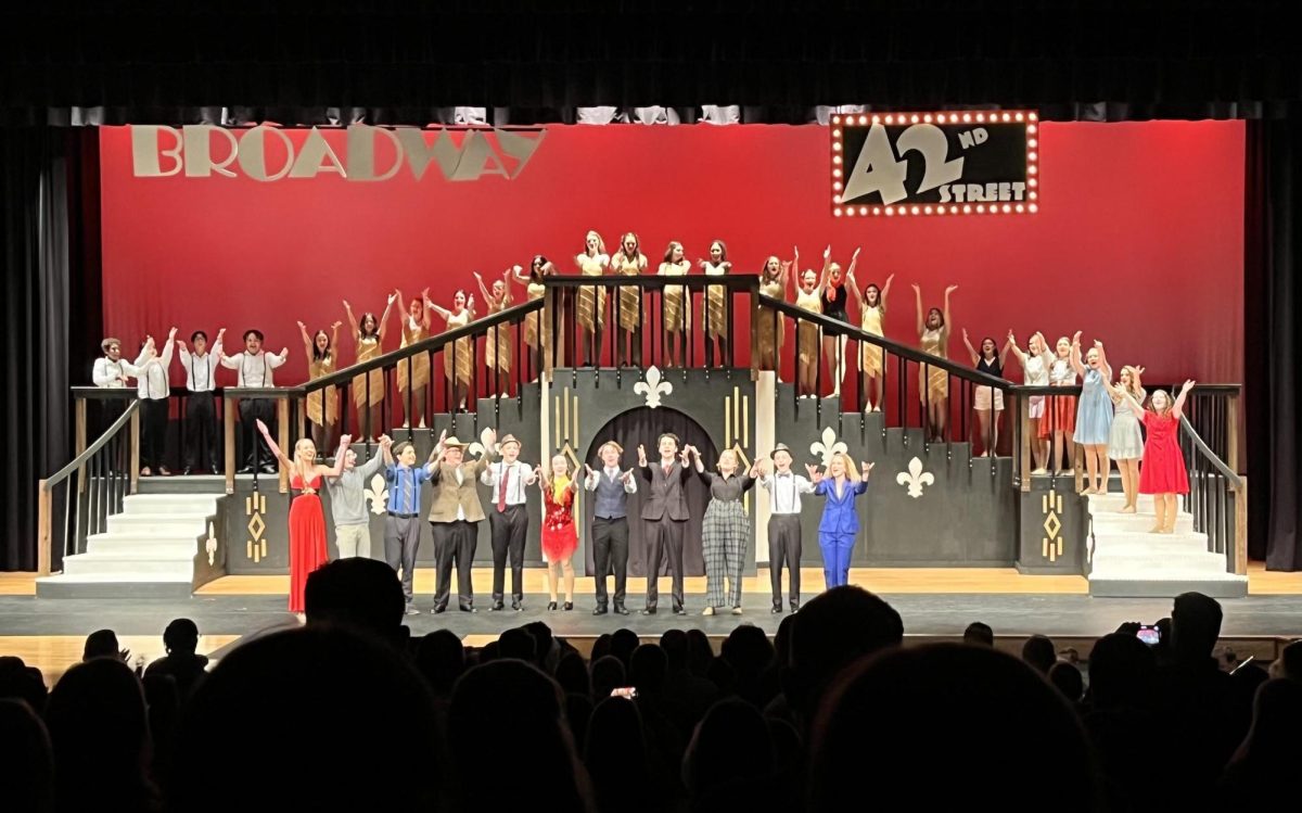 The cast of 42nd street taking their bows after their first full performance. This was the opening night of the musical. 