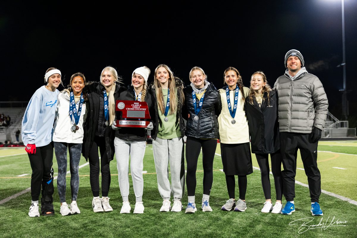 The+Elkhorn+North+girls+cross+country+team+was+recognized+at+halftime+of+the+Elkhorn+North+versus+Elkhorn+High+Class+B+State+Football+Playoff+game+on+October+27th%2C+2023.+They+were+the+Class+B+state+runner-up.