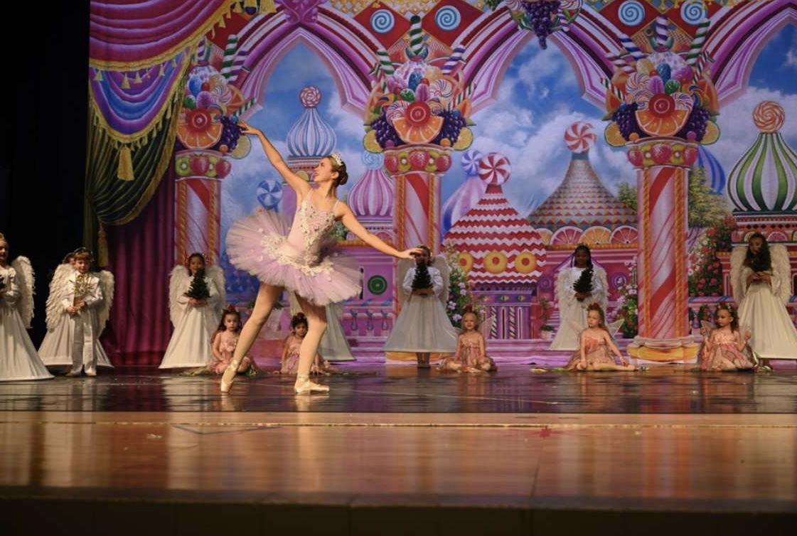Lydia Pruch performs in The Dance of the Sugar Plum Fairy.  Pruch performs on stage at Elkhorn High.