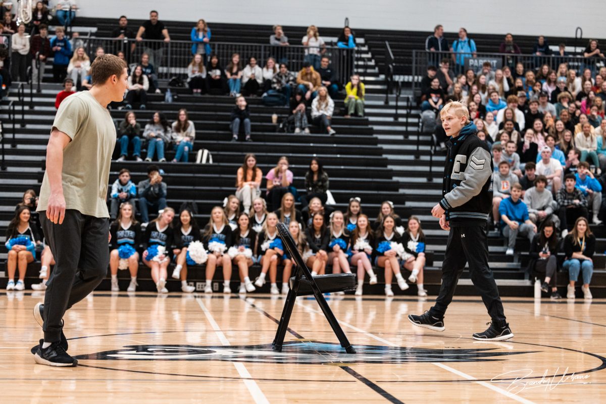 Seniors Murphy Maloney and Jayse Munter are ready to take the final chair in an intense game of musical chairs. The audience was anxiously waiting to see who the winner would be at the winter pep rally on Dec. 8th 2023.
