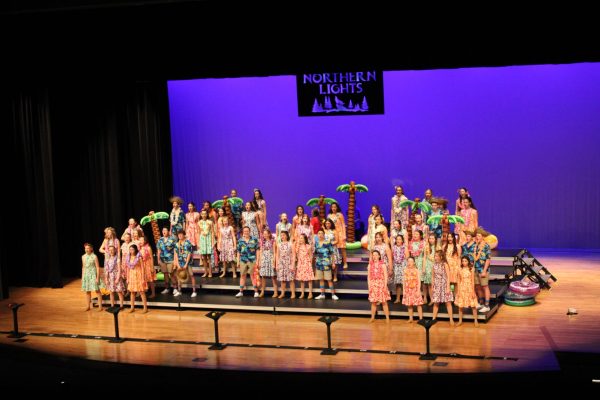A middle school show choir group performs on stage on January 27, 2024. They are a part of the Northern Lights competition.