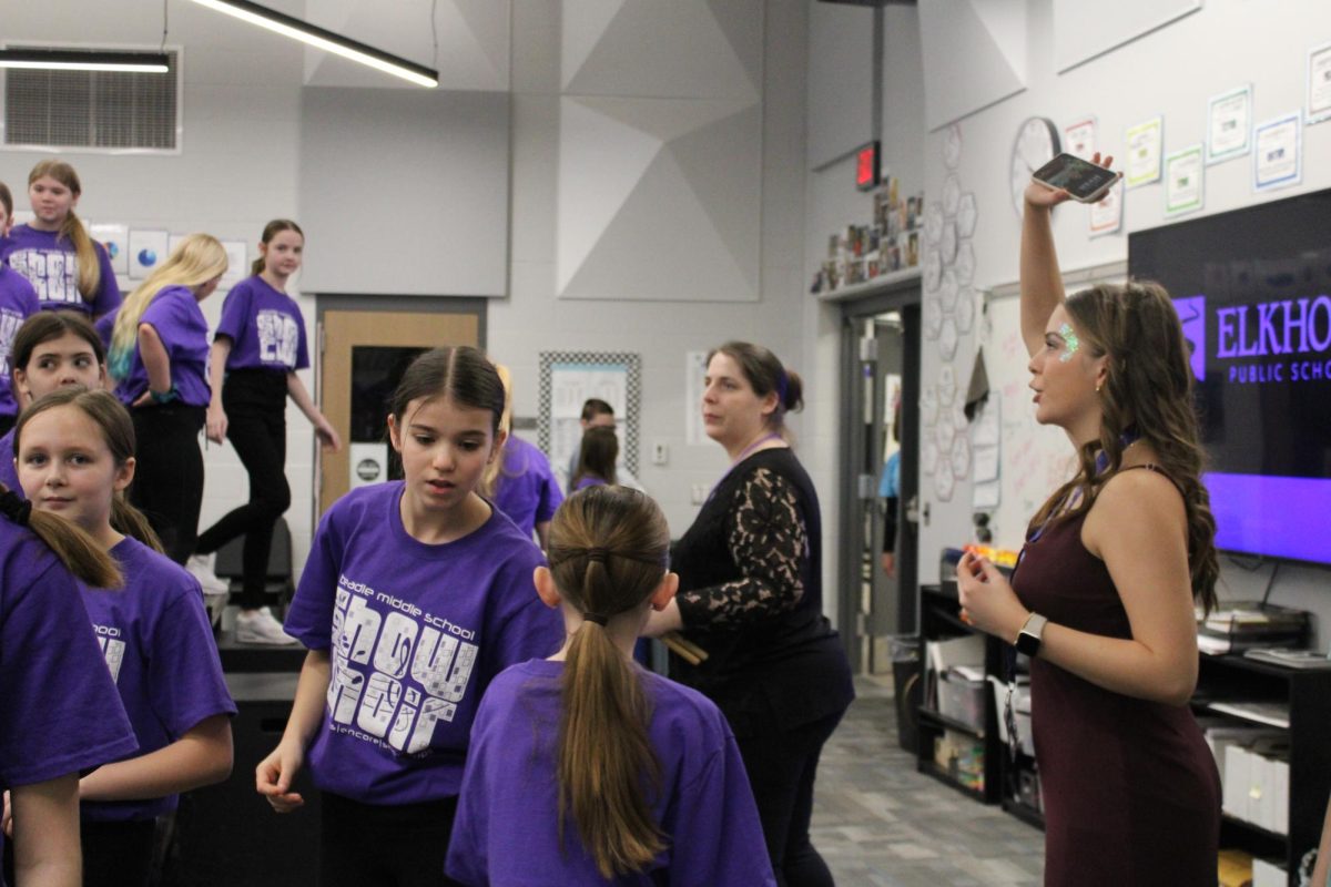 Sophomore Audra Brabec leads the middle school group to the stage. They will be the first to perform on January 27, 2024.
