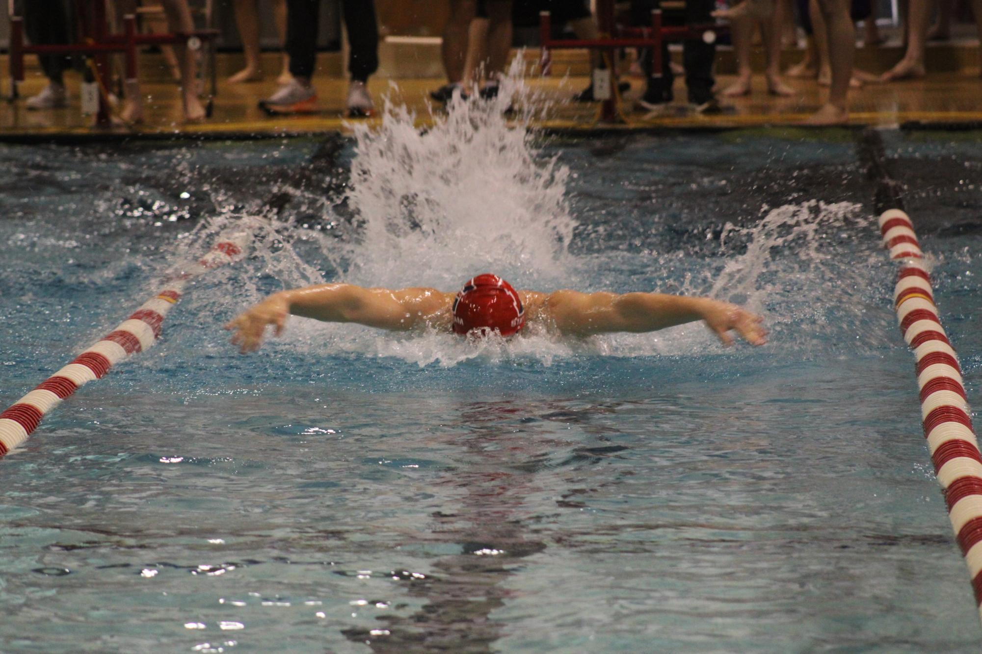 Senior Dylan Palmer swims the 100 yard butterfly on January 27, 2024. Palmers time was 58.66 seconds. 
