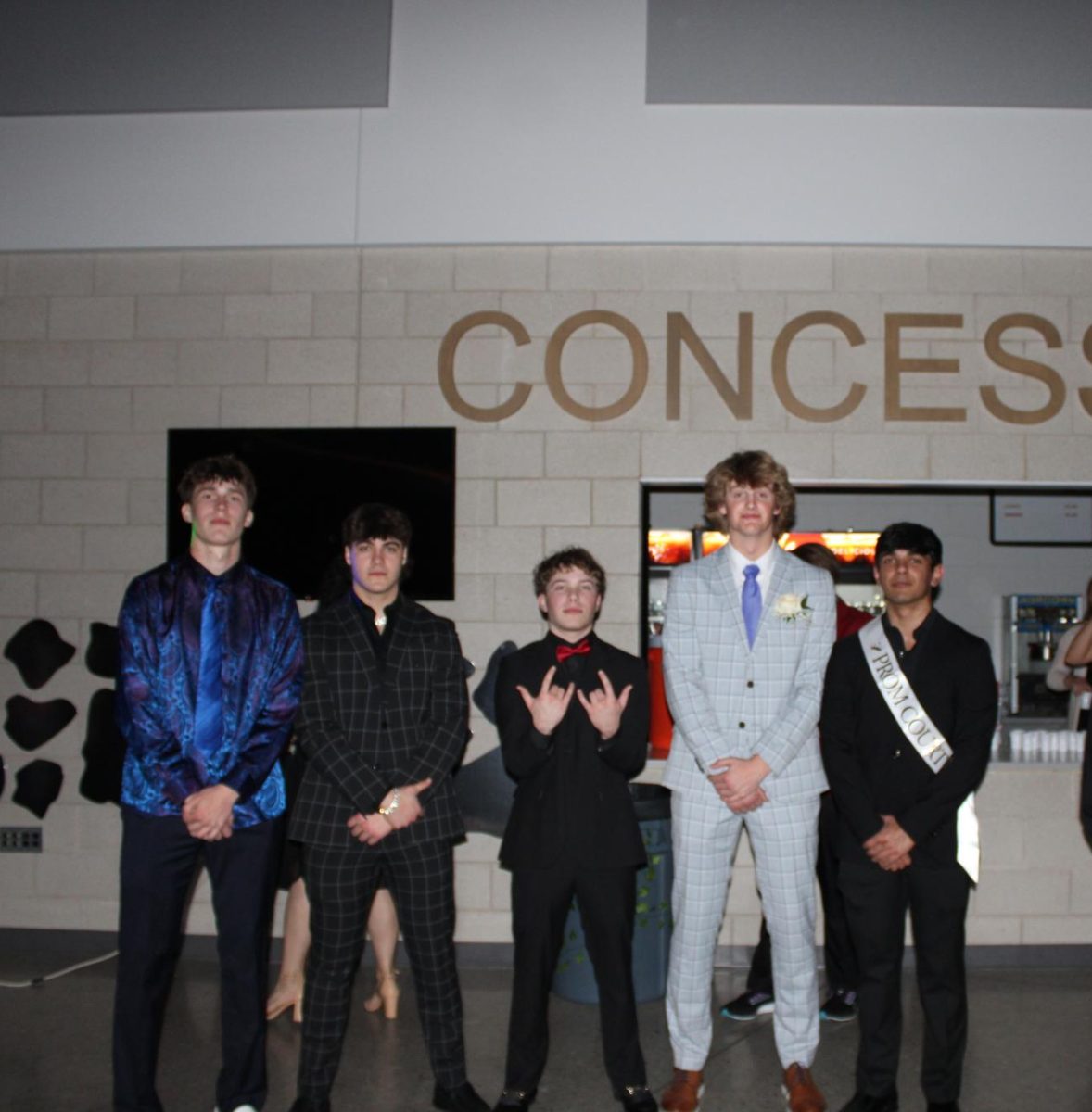 Seniors Tommy Meckna and Swade Lamb pose with juniors, Parker Thomas, Sam Huff, and Aryan Panchal at prom on April 13, 2024. The five boys had lots of fun taking pictures and talking with friends. 