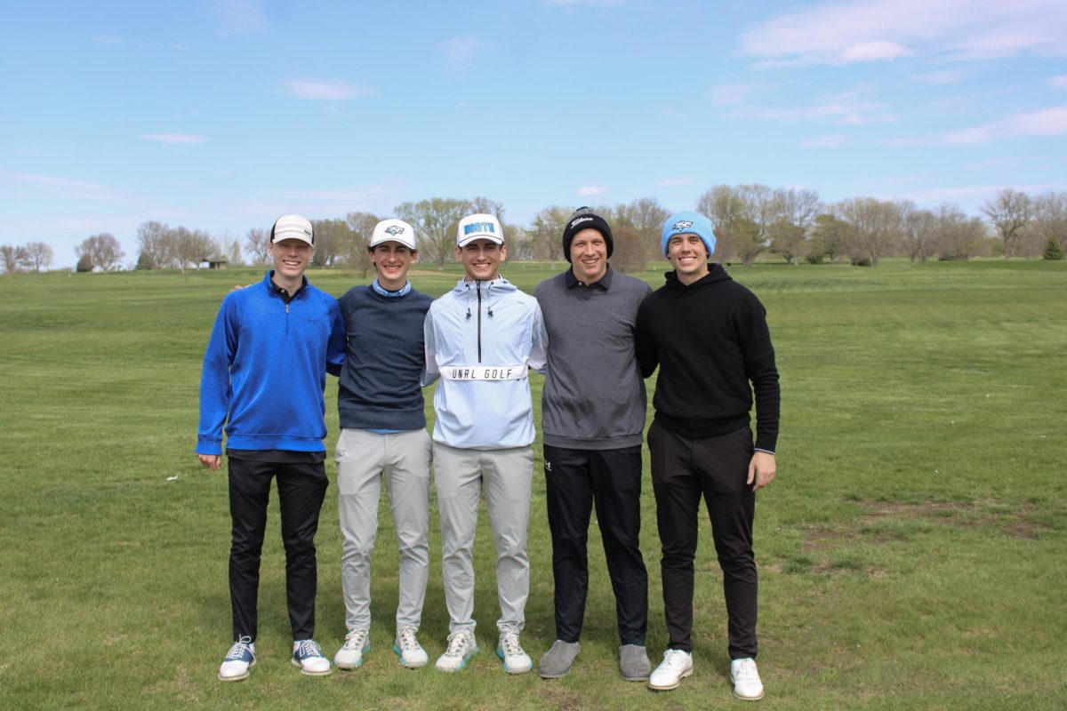 The varsity team poses for a team photo after securing the team win at the Blair Invite on April 19, 2024. Four of the players placed in top 15 highlighted by Zach Biegert winning indivudally.