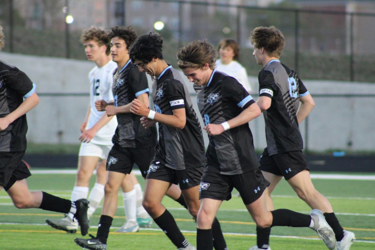 Senior Gavin Dickerson (8) celebrating after scoring a goal during the second half of the game. He played a great game against Norris on Tuesday, April 23rd.