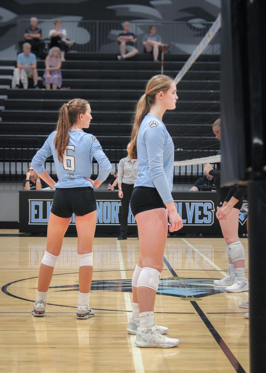 Junior Hayden Booth (6) and Sophomore Kaitlyn Huff (15) await Waverly’s serve. Both have been on varsity since their freshman year. Booth is the varsity team captain.
