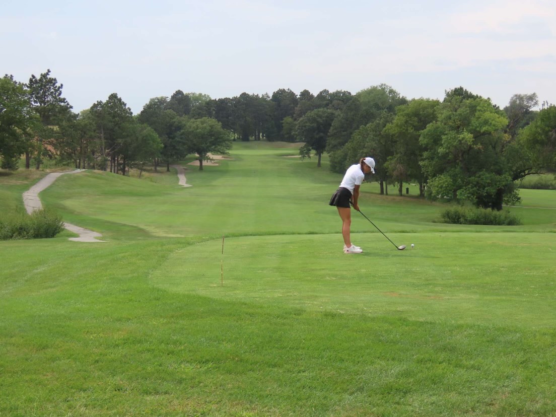 Avery Peter goes through her routine as she prepares to tee off to the next hole. This was during the Girls Gator Invite on Sept. 12. Photo Courtesy of Chelsea Mahloch.