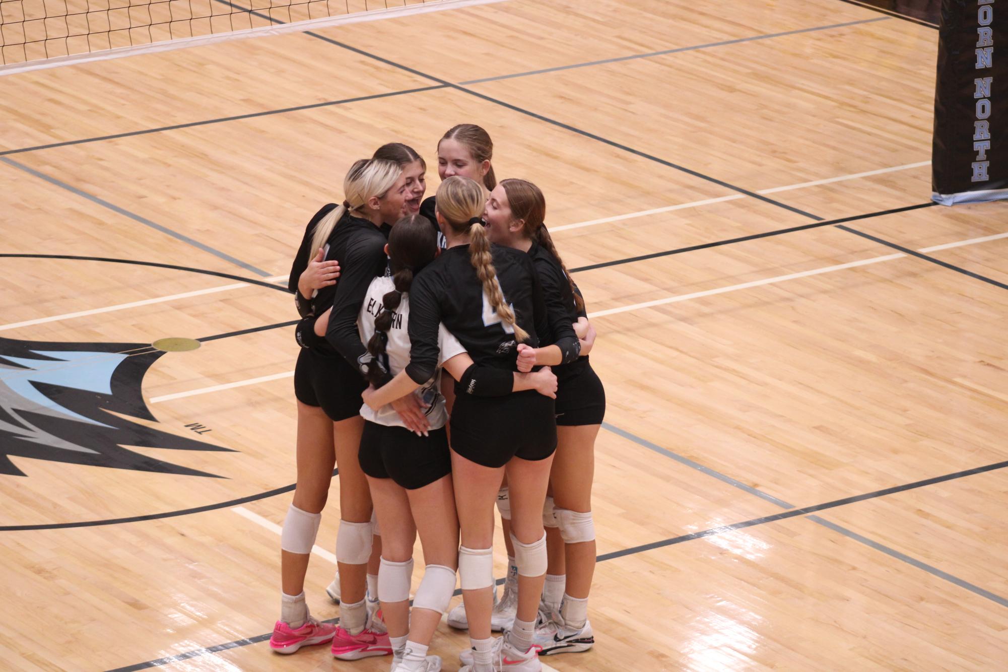 The varsity girls celebrate after winning a point against Gretna East on October 8, 2024. This was their 4th point in a row. 