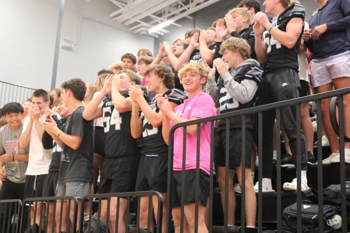 Junior section cheers on their group during the dodgeball game. Juniors were the first team out despite their livid crowd. 