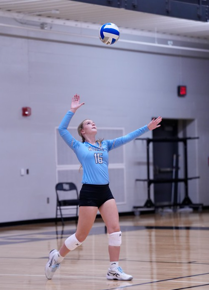 Senior Alayna Vaughn serves in game for the first time since her injury. The Wolves played against Lincoln Northwest for their senior night. Photo courtesy of Renee Vokt