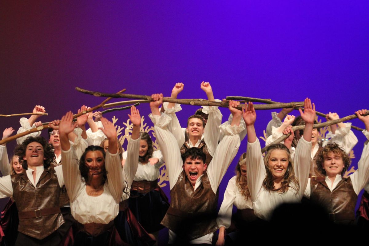 AdrENaline finishes their fourth number with the sticks in hand. They performed with tons of energy and huge vocals.