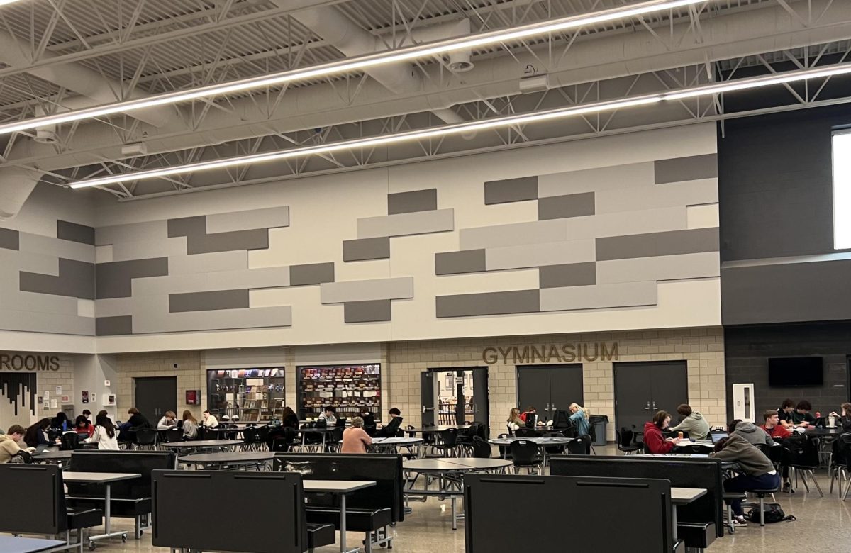 Students sit in their seating chart in study hall. 