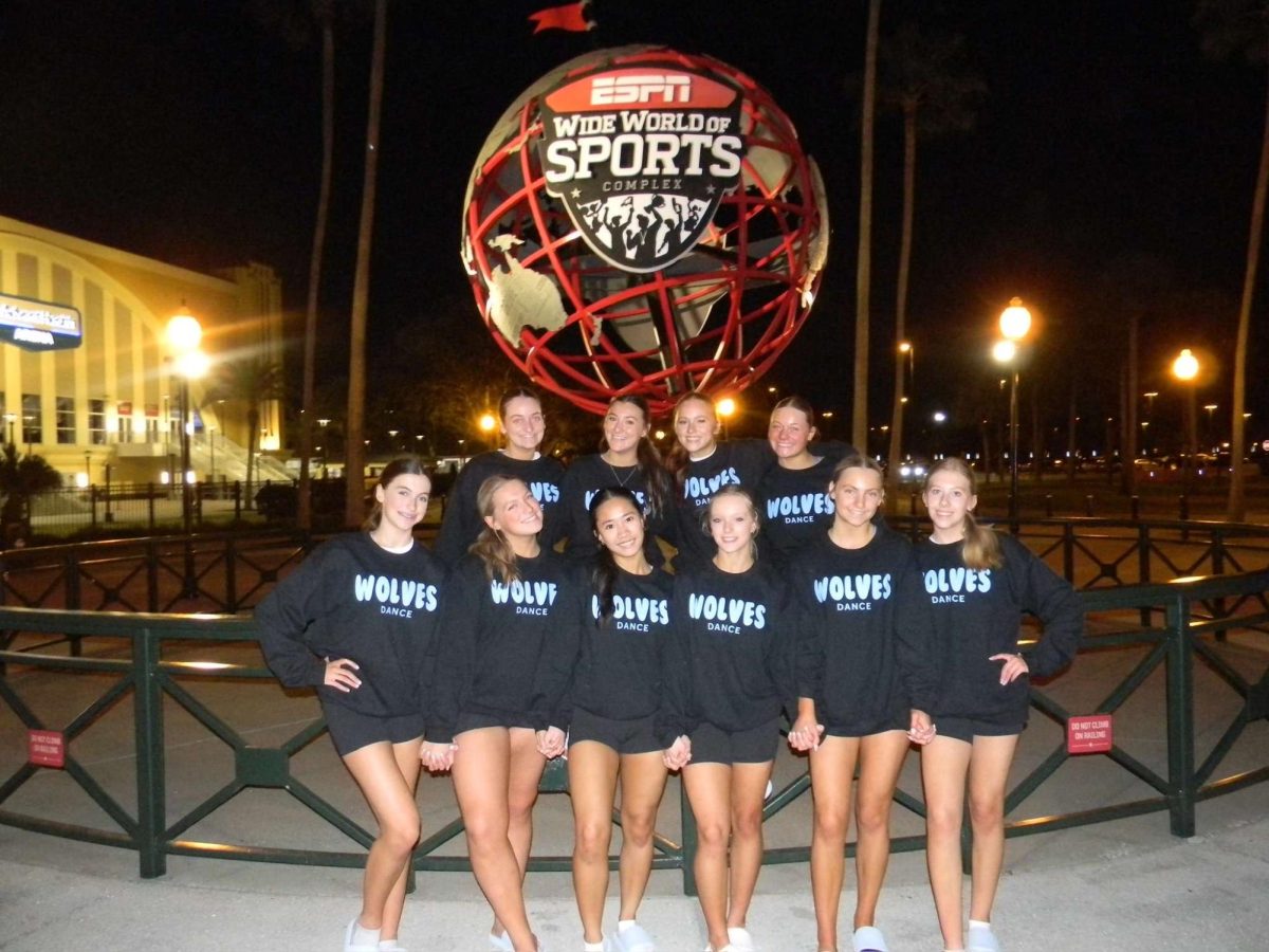 The dance team poses for a picture at nationals in Orlando in January. 