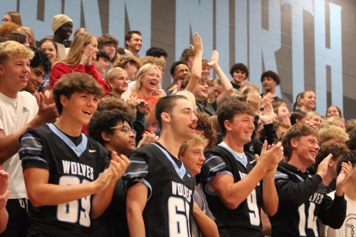 Elkhorn North Junior student Body Cheering during the final game at the pep rally. 
They showed their wolfpack sprit as Raisa Halweg wins in the final match.
Photo By Abby Kwon.
