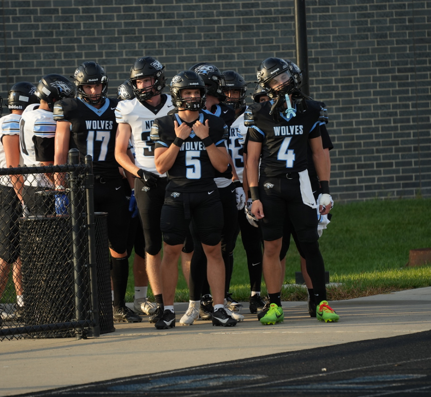Senior Ethan Beachy (5) and Alex Uchtman (4) leading the team out before the Gatorade Scrimmage on Friday August 22, 2025.
