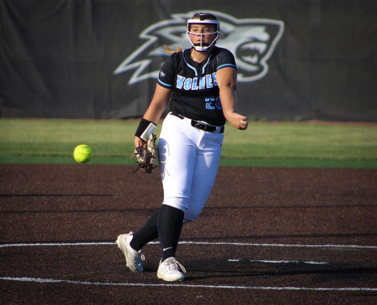 Anna Paladino pitches the ball towards home plate. Paladino then threw the first strikeout of the inning.
